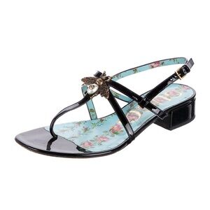 Gucci Black Sandals with Strappy Design and Flat Sole